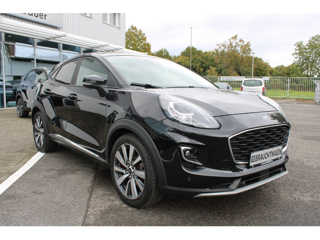 Puma 1.0l Titanium X *Pano,LED,Tot-Winkel,R.Kamera,SHZ,Park-Assist*