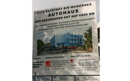 Geschichte-Baustellenschild-Neubau-Raderthalguertel-Royal-Motors-kempen
